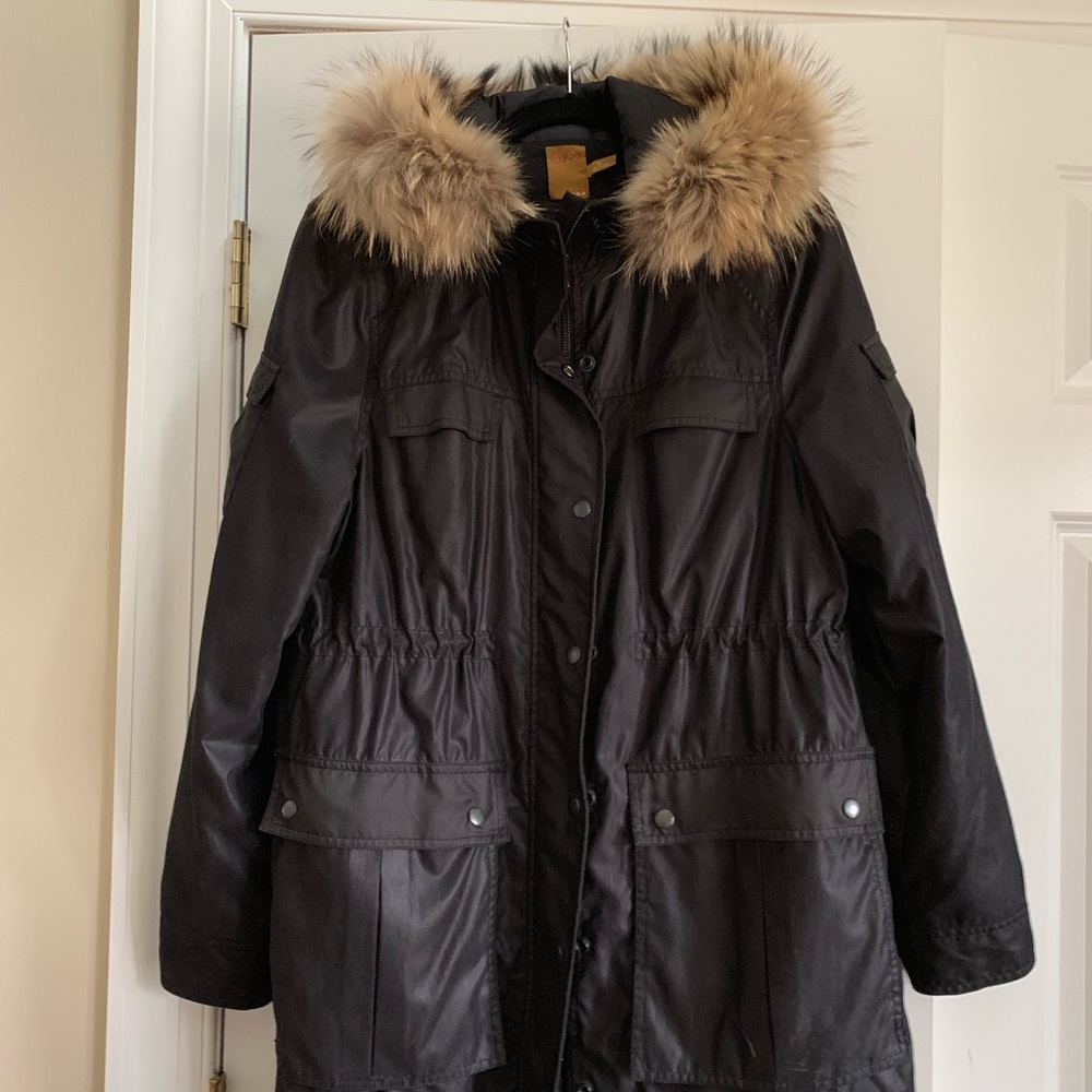 Black Jacket with fur hood...